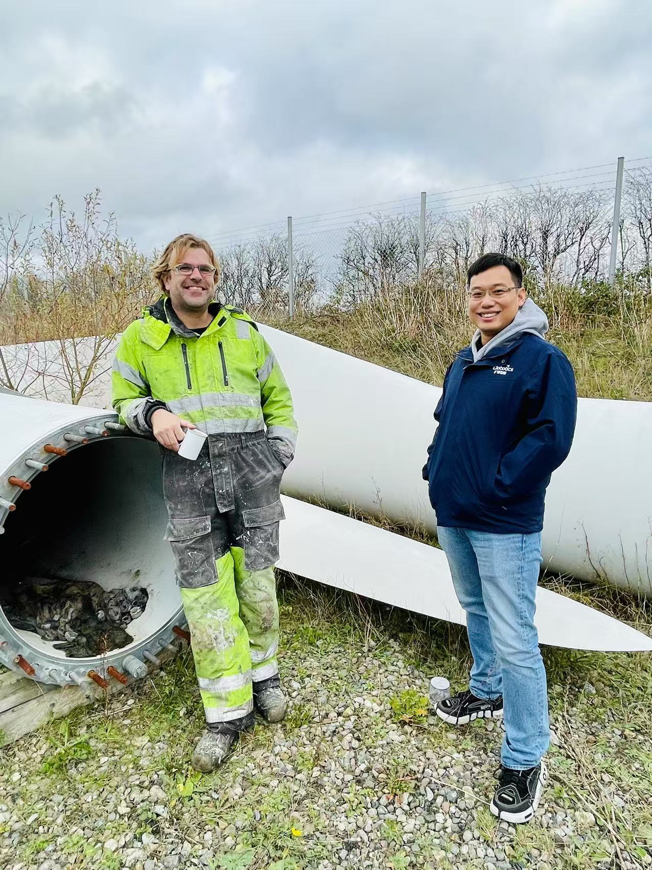 Clobotics team with wind blade