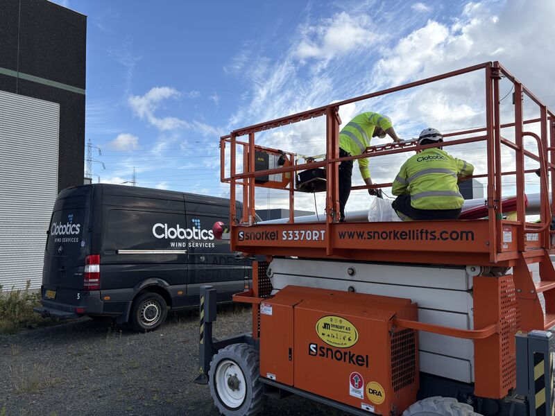 Clobotics technicians preparing field access equipment