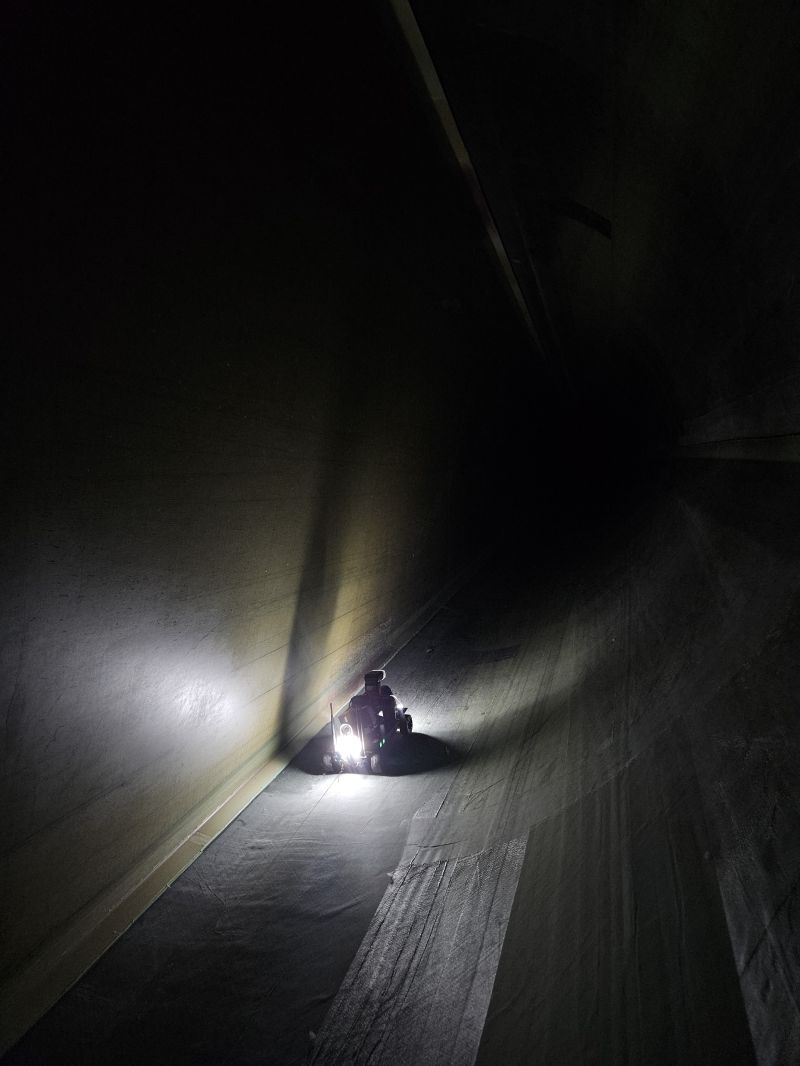 KIWI crawler travelling deeper into the dark interior of a wind turbine blade